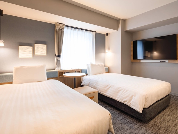 Imagen de la habitación del Hotel Comfort ERA Sapporo North. Foto 6