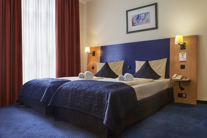 Imagen de la habitación del Hotel Comfort Frankfurt Central Station. Foto 12