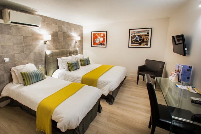 Imagen de la habitación del Hotel Comfort Hotel Cergy Pontoise. Foto 13