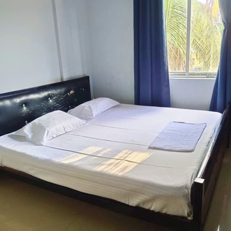 Imagen de la habitación del Hotel Comfort Hub Stay. Foto 8