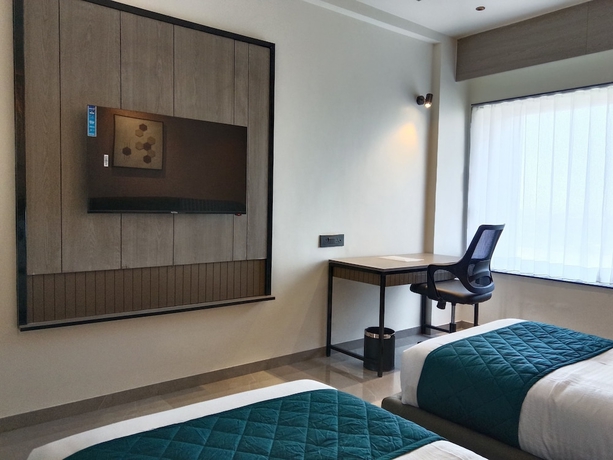 Imagen de la habitación del Hotel Comfort INN Empire Morbi. Foto 7