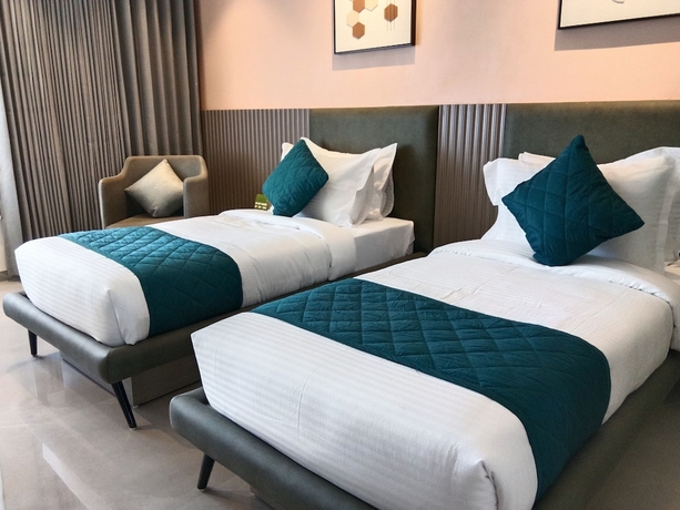 Imagen de la habitación del Hotel Comfort INN Empire Morbi. Foto 10