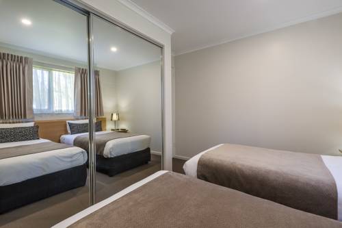 Imagen de la habitación del Hotel Comfort Inn Coach and Bushmans. Foto 2