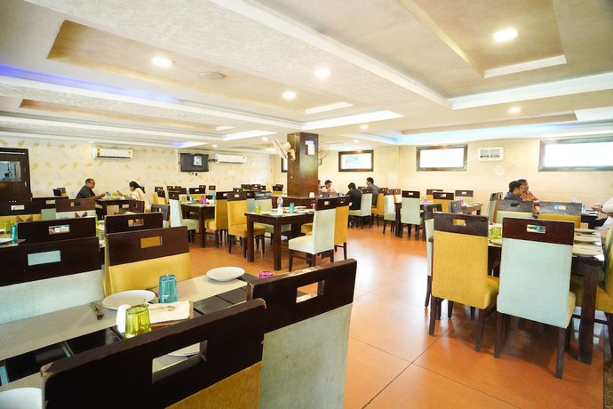 Imagen del bar/restaurante del Hotel Comfort Inn Coral River. Foto 4