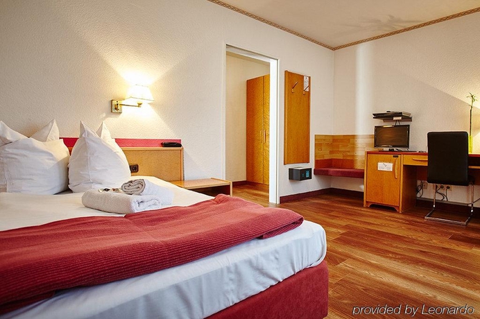 Imagen de la habitación del Hotel Comfort Inn Frankfurt Karben. Foto 9