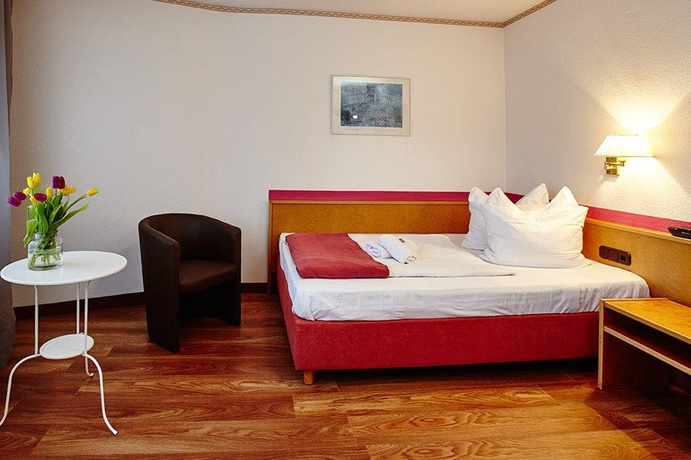 Imagen de la habitación del Hotel Comfort Inn Frankfurt Karben. Foto 10