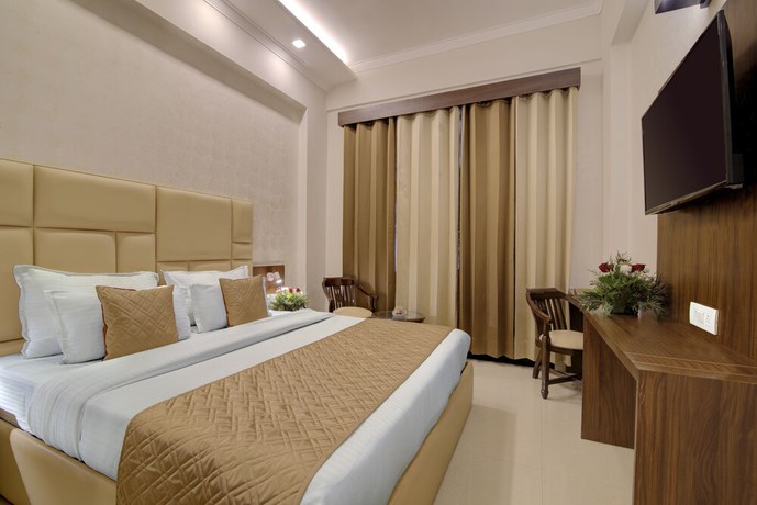 Imagen de la habitación del Hotel Comfort Inn Karnal. Foto 6