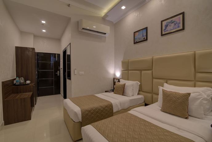 Imagen de la habitación del Hotel Comfort Inn Karnal. Foto 11