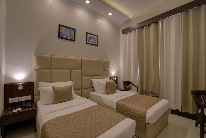 Imagen de la habitación del Hotel Comfort Inn Karnal. Foto 12