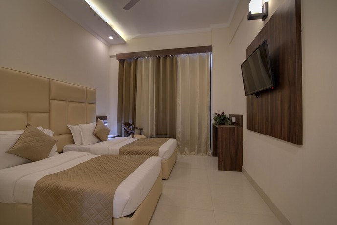 Imagen de la habitación del Hotel Comfort Inn Karnal. Foto 16