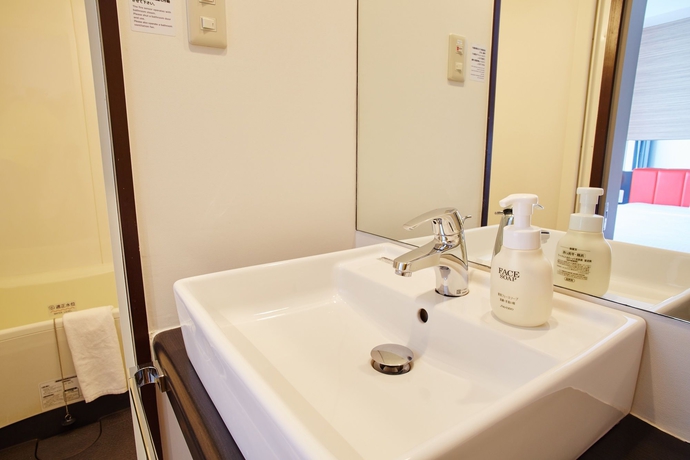 Imagen de la habitación del Hotel Comfort Inn Naha Tomari Port. Foto 9