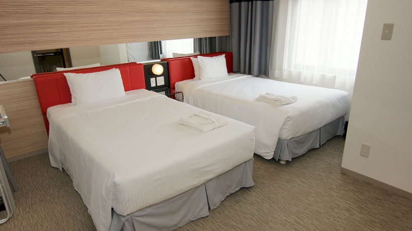 Imagen de la habitación del Hotel Comfort Inn Naha Tomari Port. Foto 13