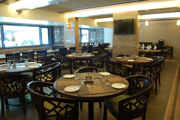 Imagen del bar/restaurante del Hotel Comfort Inn President. Foto 6