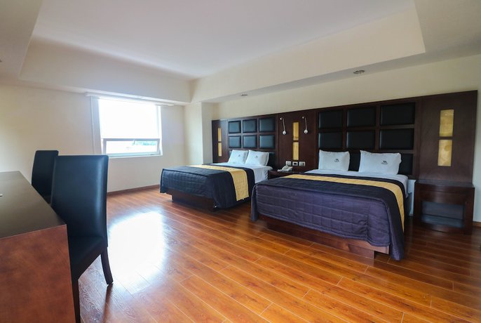 Imagen de la habitación del Hotel Comfort Inn Puebla Centro Hist&oacute;rico. Foto 4