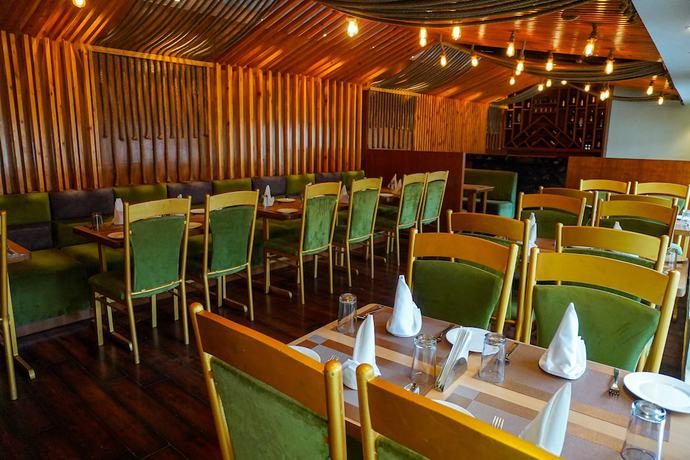 Imagen del bar/restaurante del Hotel Comfort Inn Snow Park, Manali. Foto 3