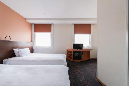 Imagen de la habitación del Hotel Comfort Inn Tokyo Roppongi. Foto 6
