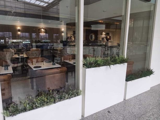 Imagen del bar/restaurante del Hotel Comfort Inn Tulip Heights. Foto 8