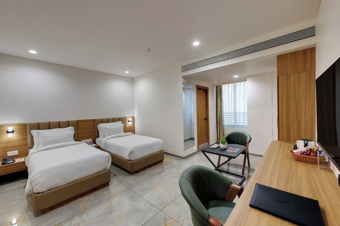 Imagen de la habitación del Hotel Comfort Inn sapphire Chandkheda. Foto 11
