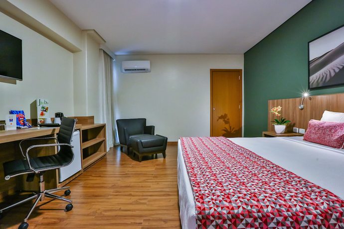 Imagen de la habitación del Hotel Comfort Mogi Gua&ccedil;u. Foto 12