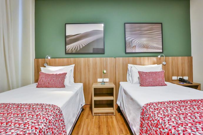 Imagen de la habitación del Hotel Comfort Mogi Gua&ccedil;u. Foto 13