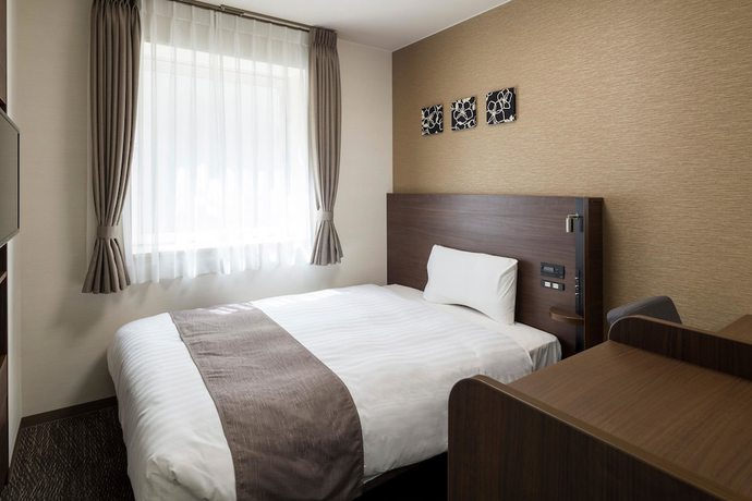 Imagen de la habitación del Hotel Comfort Osaka Shinsaibashi. Foto 5