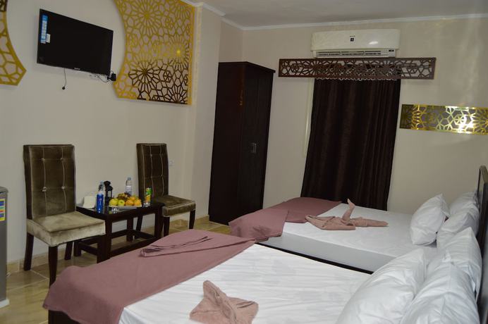Imagen de la habitación del Hotel Comfort Pyramids inn. Foto 16