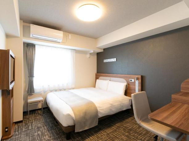 Imagen de la habitación del Hotel Comfort Shin-osaka. Foto 11