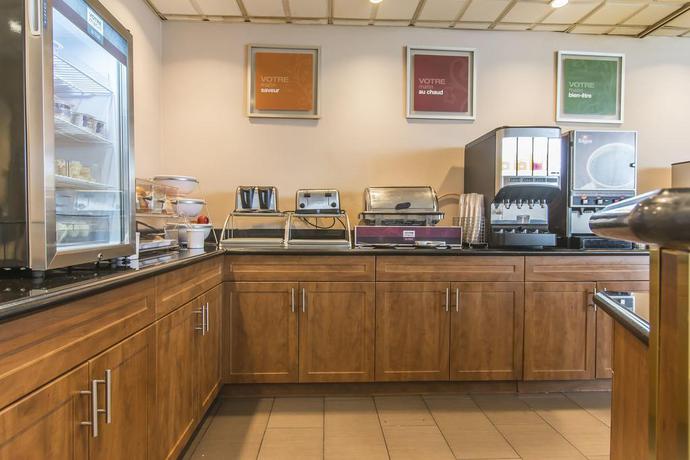 Imagen del bar/restaurante del Hotel Comfort Suites Downtown, Montreal. Foto 2