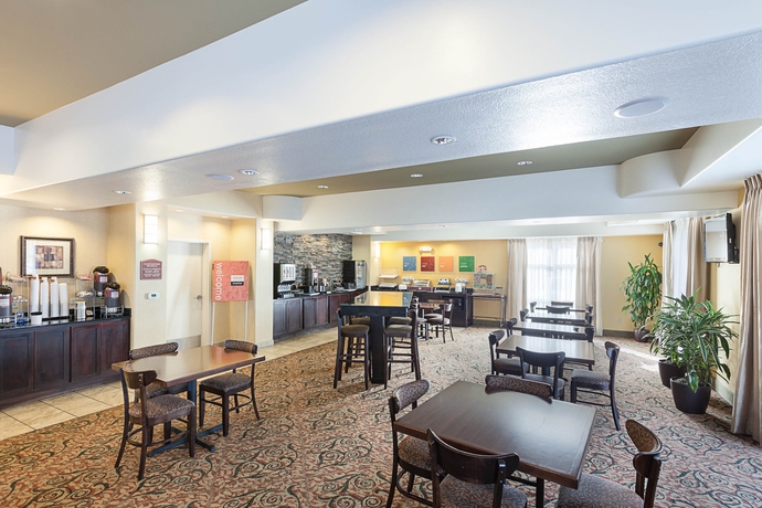 Imagen del bar/restaurante del Hotel Comfort Suites Medical Center Near Six Flags. Foto 1