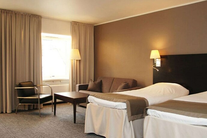 Imagen de la habitación del Hotel Comfort Victoria Floro. Foto 11