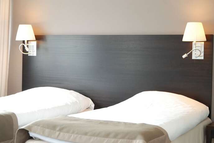 Imagen de la habitación del Hotel Comfort Victoria Floro. Foto 15