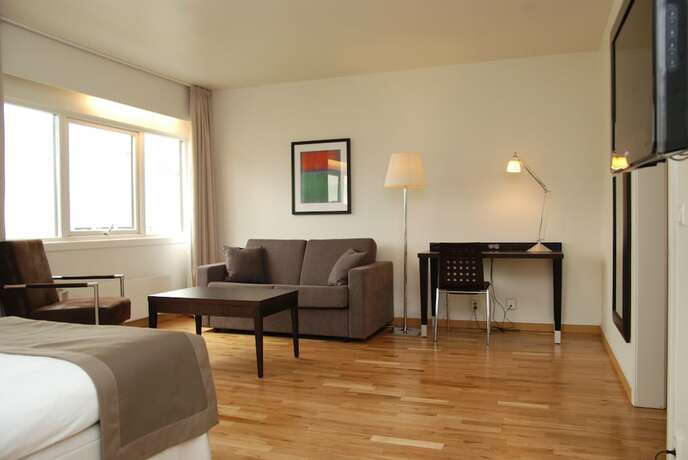 Imagen de la habitación del Hotel Comfort Victoria Floro. Foto 16