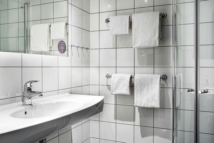 Imagen de la habitación del Hotel Comfort Xpress Youngstorget. Foto 8