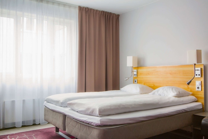 Imagen de la habitación del Hotel Comfort Xpress Youngstorget. Foto 10