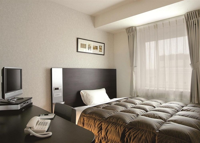 Imagen de la habitación del Hotel Comfort Yokohama Kannai. Foto 12