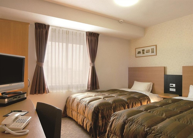 Imagen de la habitación del Hotel Comfort Yokohama Kannai. Foto 13