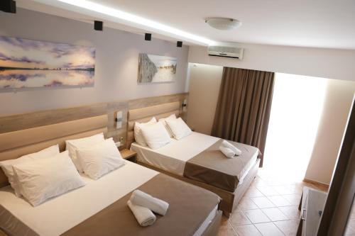 Imagen de la habitación del Hotel Comfort and Villas. Foto 12