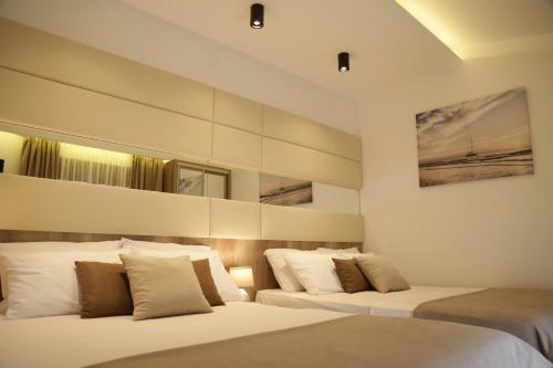 Imagen de la habitación del Hotel Comfort and Villas. Foto 19