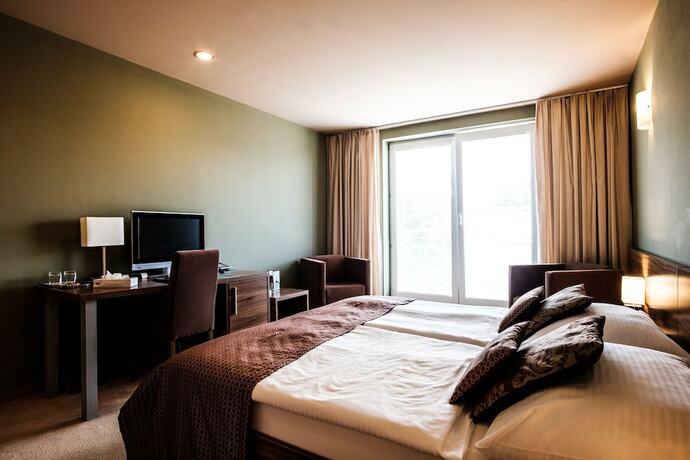 Imagen de la habitación del Hotel Comfort with free wellness and fitness Centrum. Foto 14