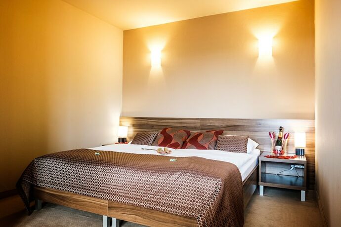 Imagen de la habitación del Hotel Comfort with free wellness and fitness Centrum. Foto 15