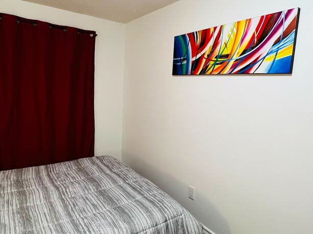 Imagen de la habitación del Hotel ComfyHome. Foto 5