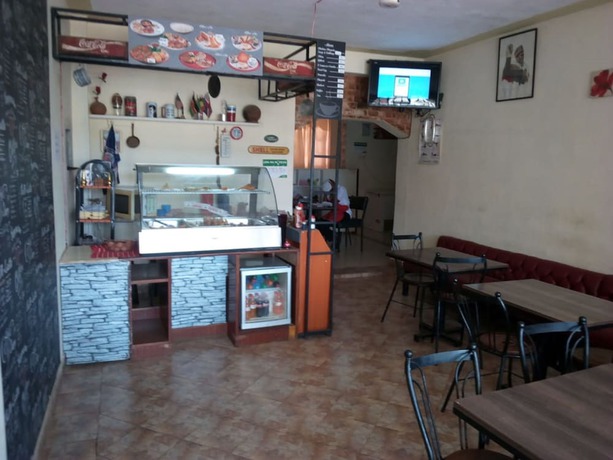 Imagen del bar/restaurante del Hotel Comi Village. Foto 6