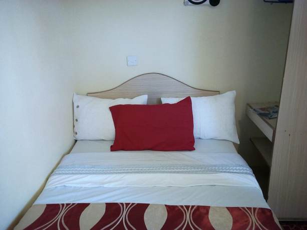 Imagen de la habitación del Hotel Comi Village. Foto 12