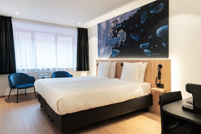 Imagen de la habitación del Hotel Comic Art Hotel. Foto 12