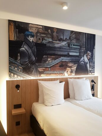 Imagen de la habitación del Hotel Comic Art Hotel. Foto 15