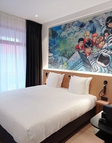 Imagen de la habitación del Hotel Comic Art Hotel. Foto 16