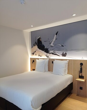 Imagen de la habitación del Hotel Comic Art Hotel. Foto 17