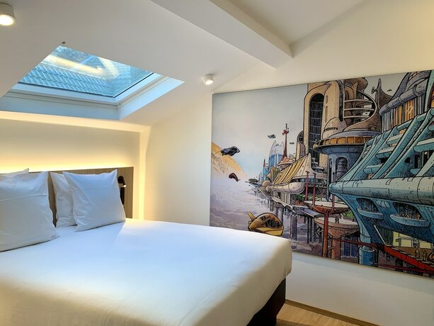 Imagen de la habitación del Hotel Comic Art Hotel. Foto 18