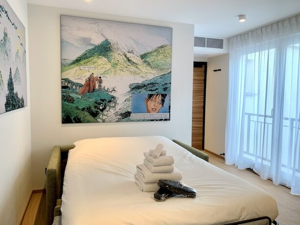 Imagen de la habitación del Hotel Comic Art Hotel. Foto 19