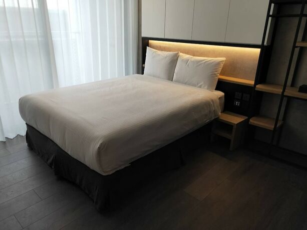 Imagen de la habitación del Hotel Comin' Place. Foto 11